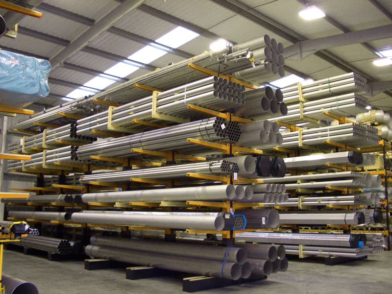 Cantilever racking storing long loads manufactured, designed and installed by S.E.M.CO – UK Suppliers of heavy-duty warehouse and Yard Racking